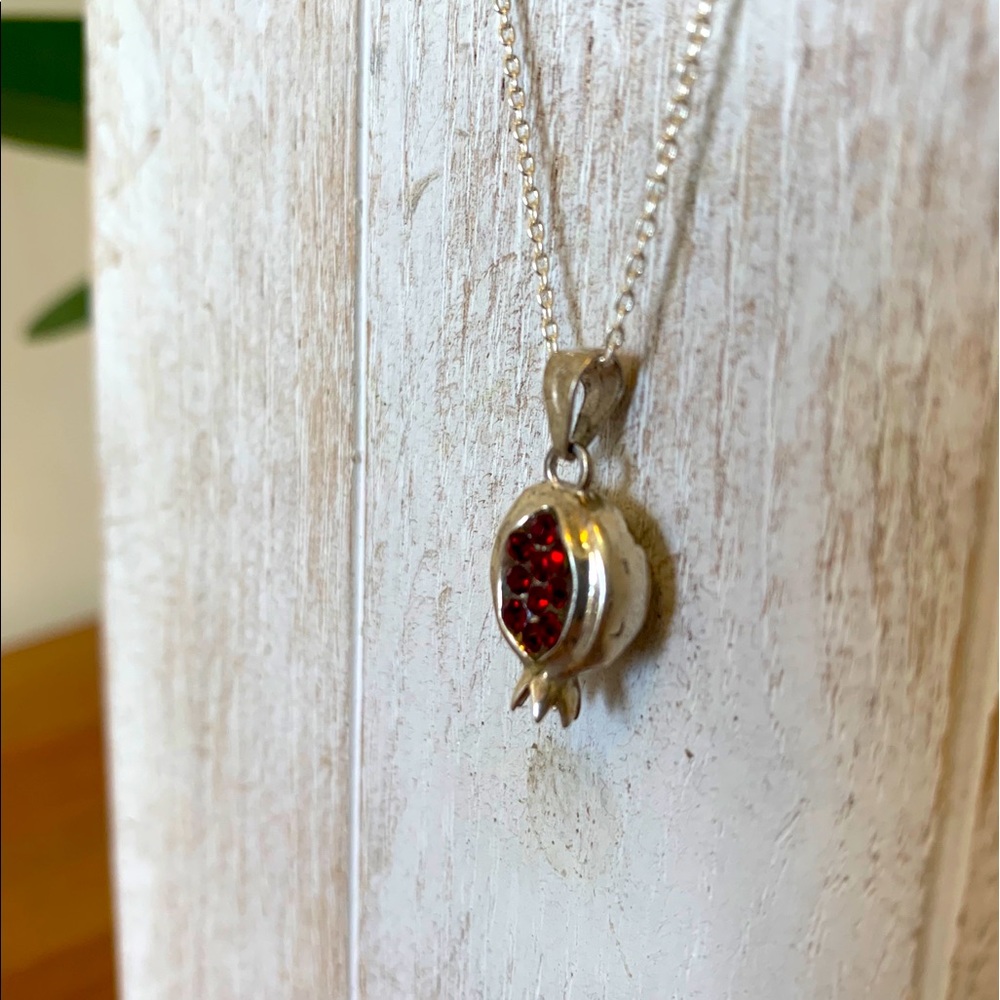 Necklace with pomegranate pendant